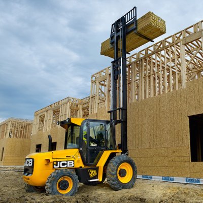 Forklift unloading machinery and industrial equipment in Staines-upon-Thames